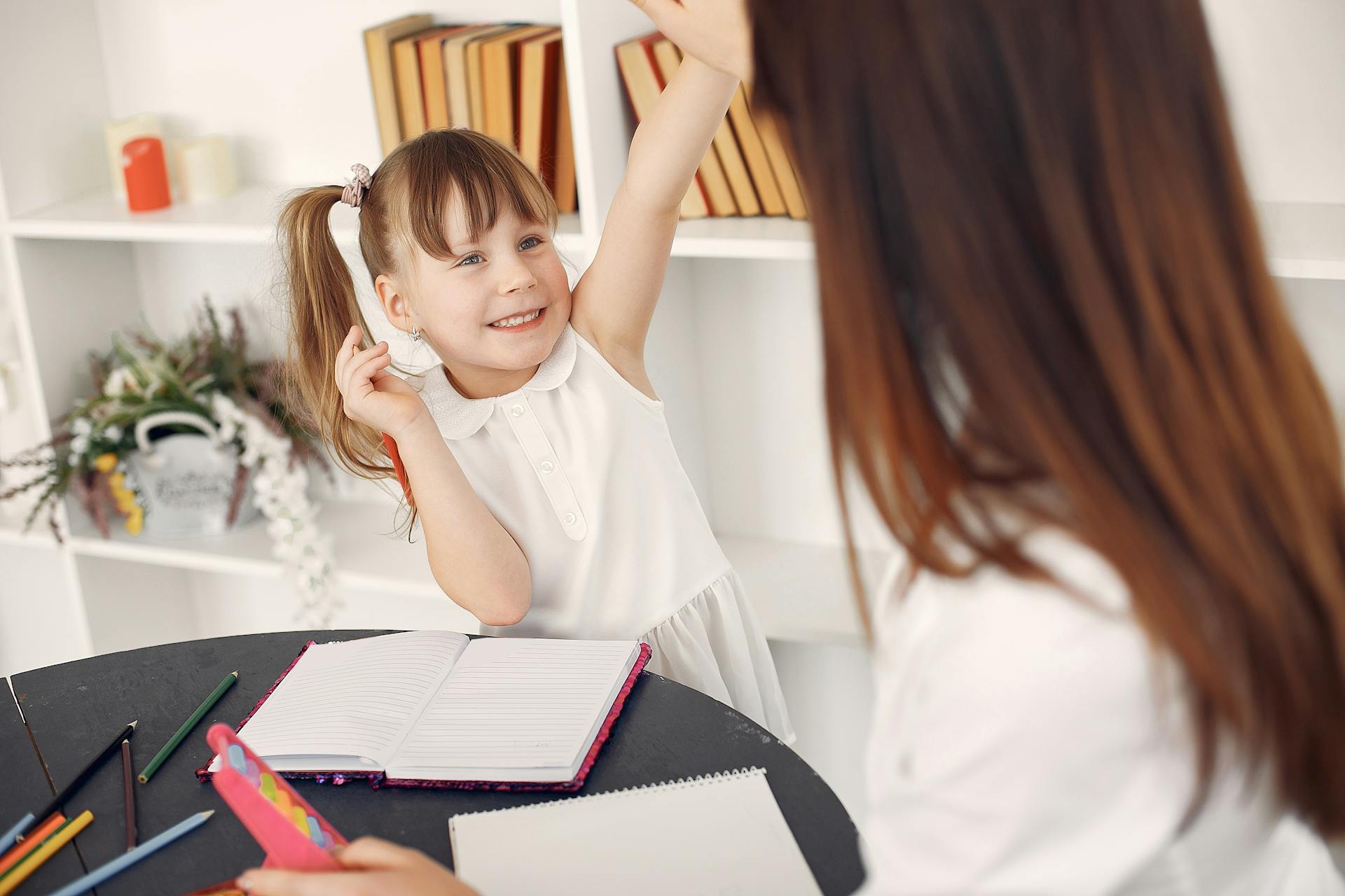 a young teacher celebrates her student's success